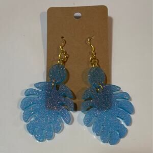 Handmade epoxy‎ resin monstera leaf earrings - blue glitter w/ rosegold flecks
